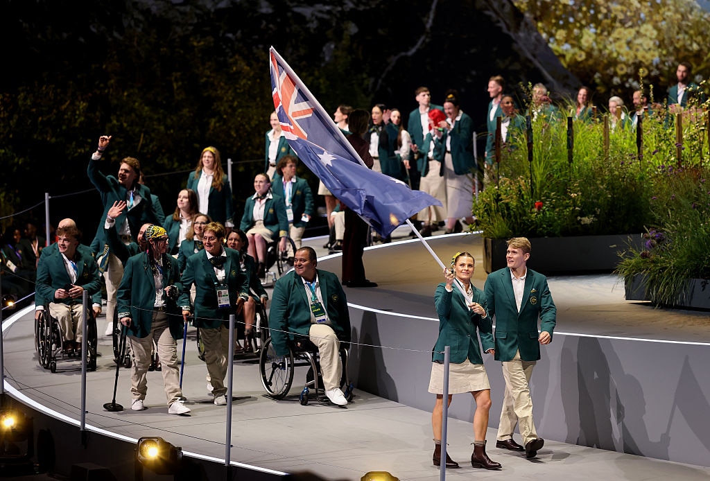 Nina Kennedy carries the flag at the 2026 Commonwealth Games
