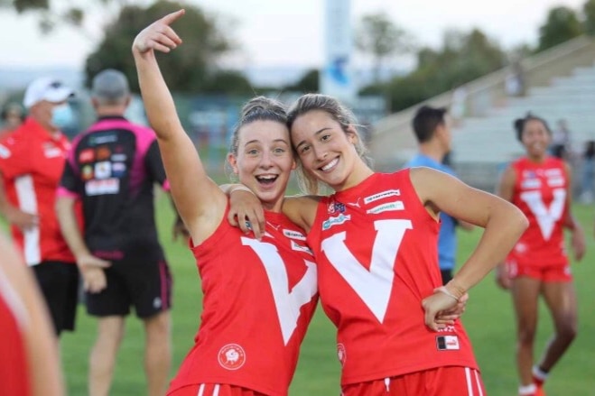 Amelie Borg (right) is pictured with her North Adelaide SANFLW teammate