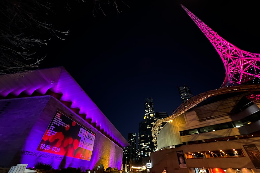 Buildings in Melbourne bathed in a pink light