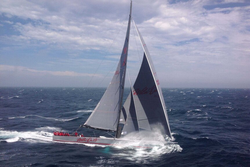 Wild Oats XI crashes through the waves off Tasmania's south-east on the home stretch of the 2013 Sydney-Hobart Yacht Race.