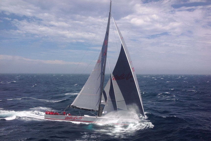 Wild Oats XI crashes through the waves off Tasmania's south-east on the home stretch of the 2013 Sydney-Hobart Yacht Race.