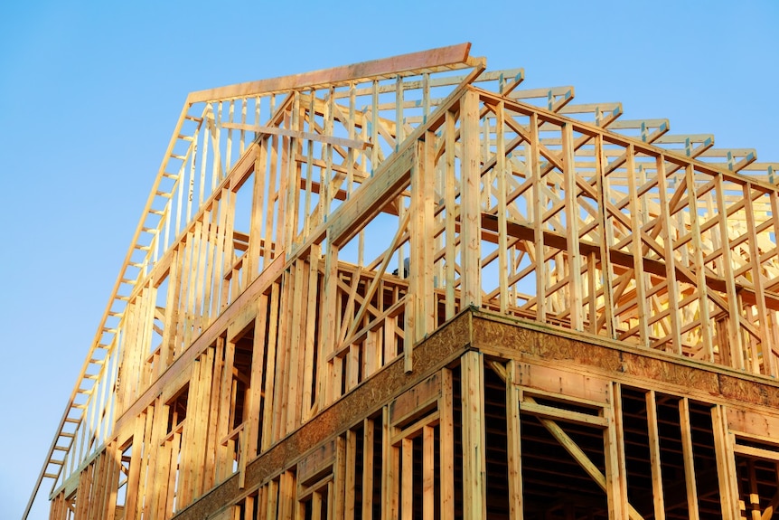 A house frame being constructed with timber.