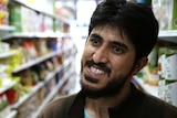 Ibrar Hussain in his grocery store.
