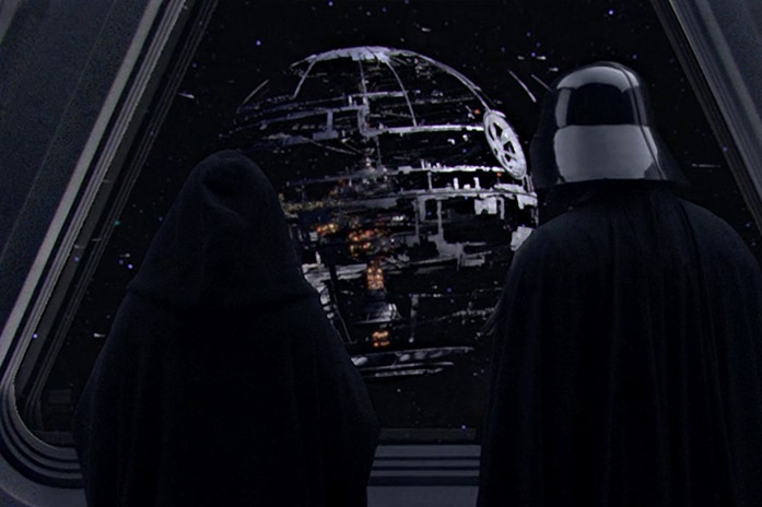 The Emperor and Darth Vader survey the construction of the Death Star