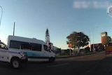 Queensland police chase a stolen Blue Care van through streets with elderly patient inside.