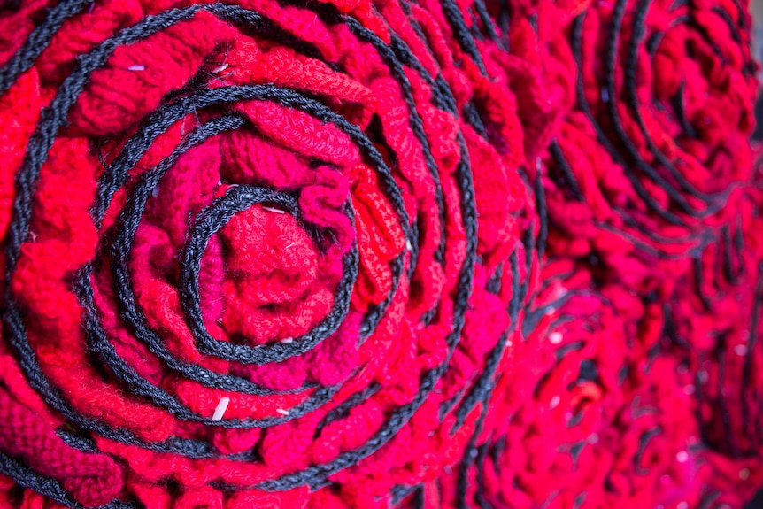 Rolls of crochet poppies