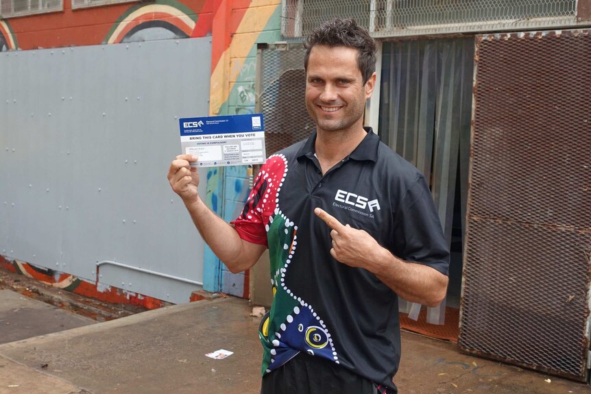 Gavin Wanganeen with a vote card out the front of a polling booth in the APY Lands.