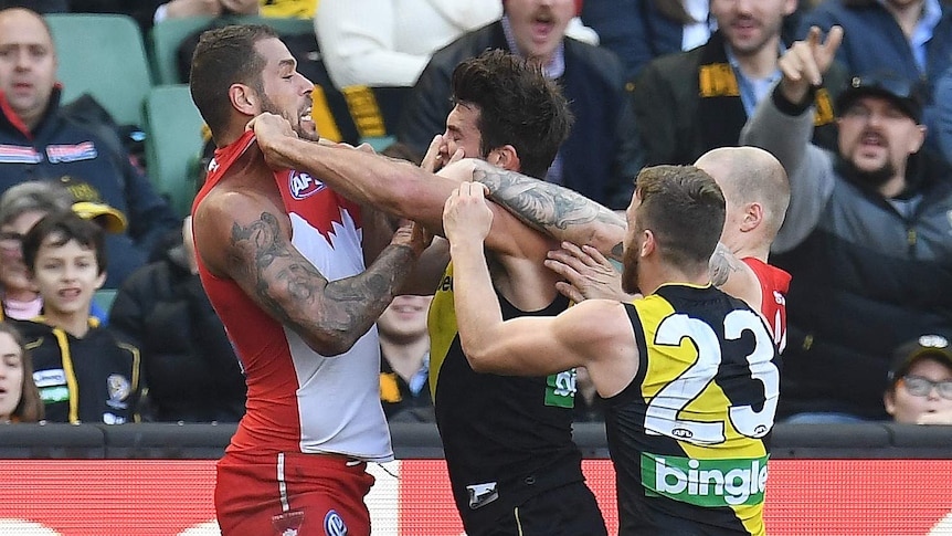 Lance Franklin and Alex Rance square up
