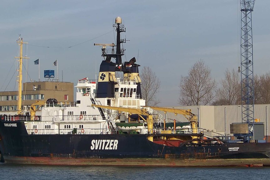 A boat with the Svitzer logo on the side.