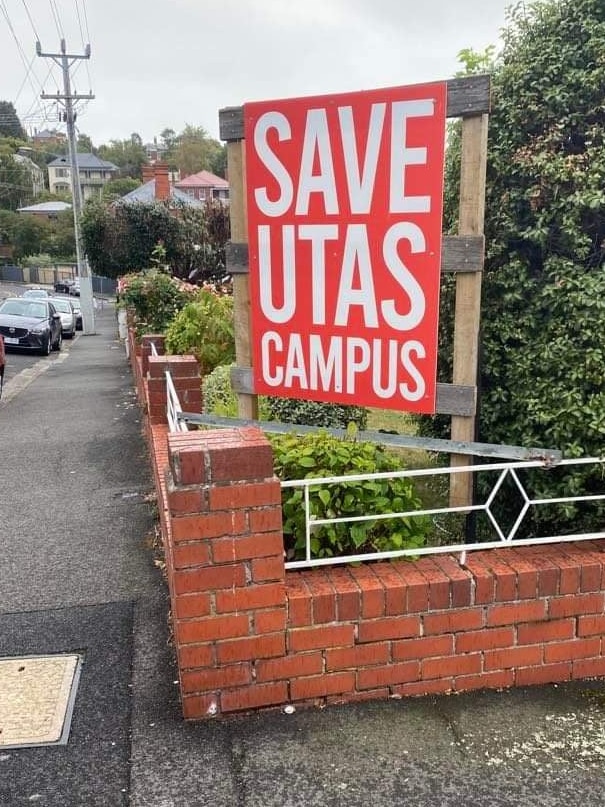 Save UTAS campus signage erected in a front yard of a Tasmanian residence.