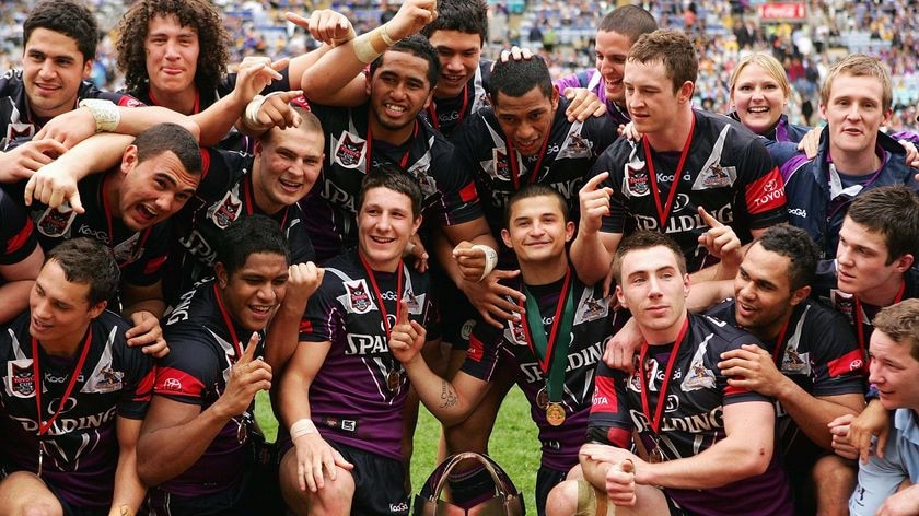 Melbourne's young crop celebrate with the under-20s trophy.