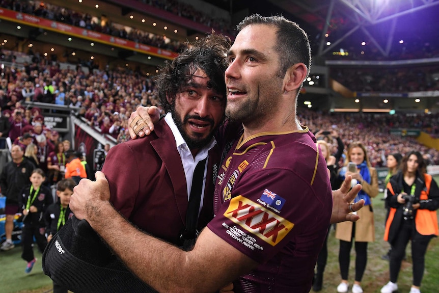 Cameron Smith of the Queensland Maroons reacts with an emotional Johnathan Thurston following State of Origin Game 3.