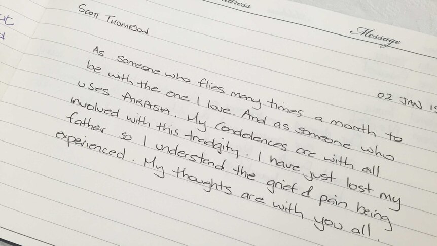 A handwritten condolence note to victims of the AirAsia QZ8501 accident.