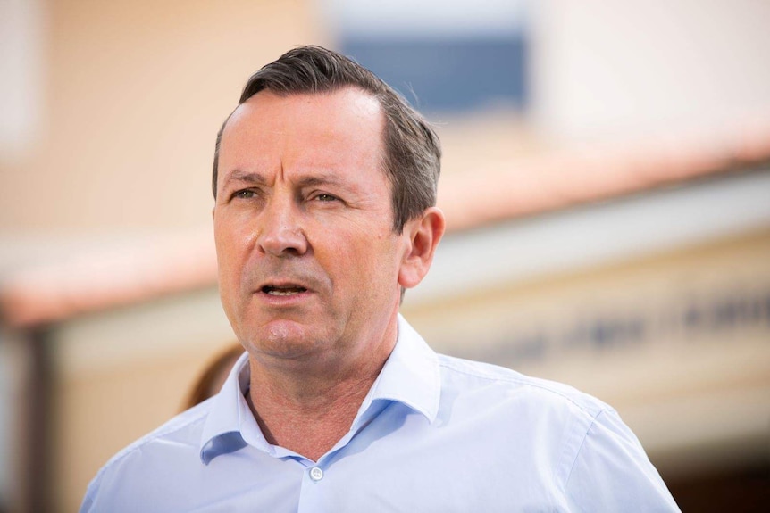 A head and shoulder shot of Mark McGowan speaking to the media.