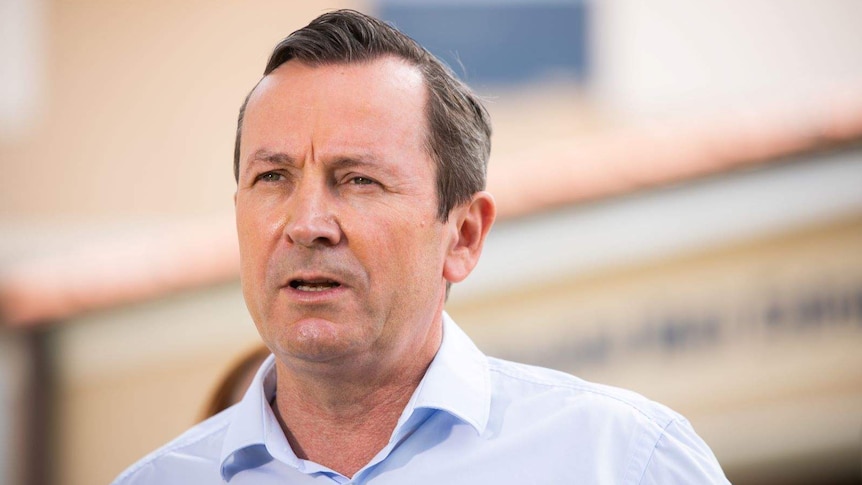 A head and shoulder shot of Mark McGowan speaking to the media.