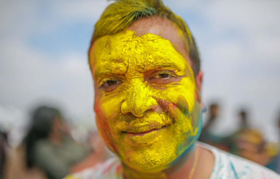Tarak Patel covered in coloured powder