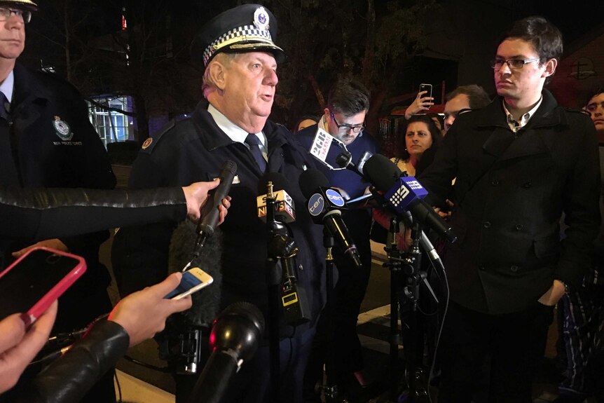 Assistant Commissioner Denis Clifford addressing the media.