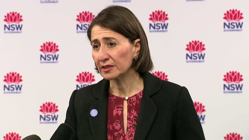 A woman talking with a white background.