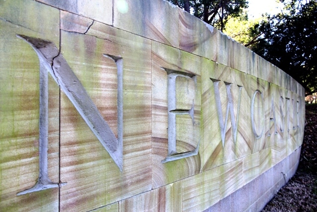 A feature wall with "Newcastle" embossed on it.