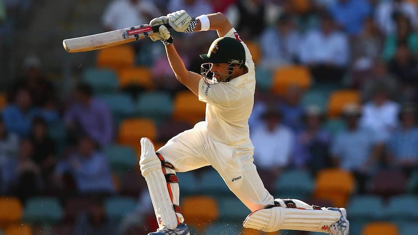 Australian opener Ed Cowan plays a cover drive during the first Test against South Africa.