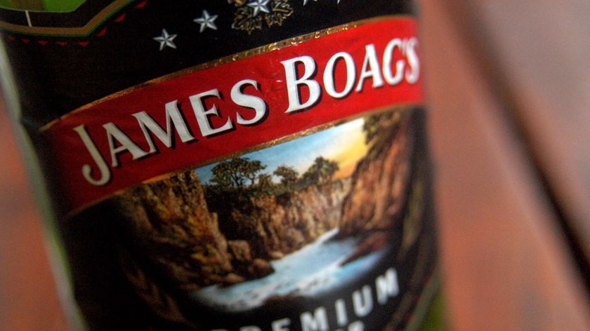 A bottle of James Boag's Premium Lager sits on a table