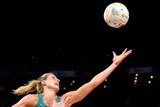 Laura Geitz of Australia reaches for the ball while fending off Bailey Mes of New Zealand during the gold medal match.