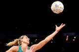 Laura Geitz of Australia reaches for the ball while fending off Bailey Mes of New Zealand during the gold medal match.