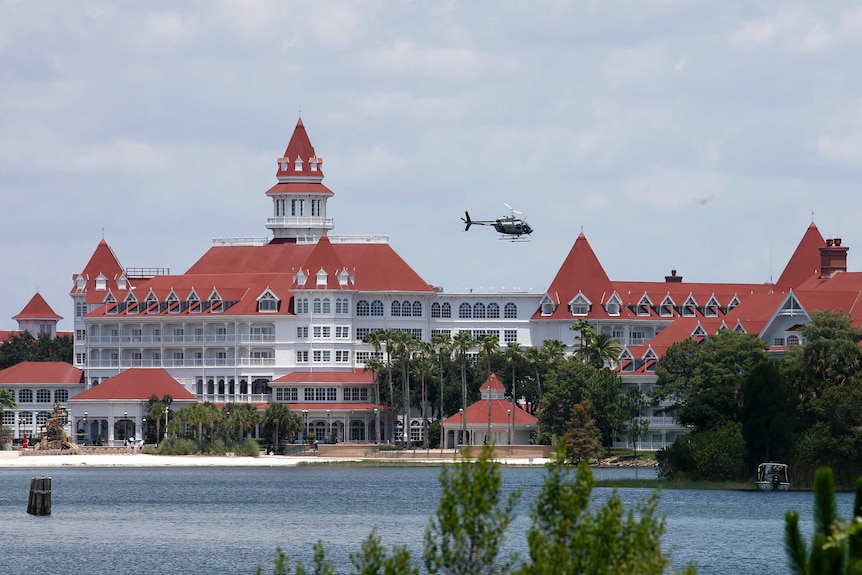 A search helicopter at Disney World where an alligator dragged a boy into the water
