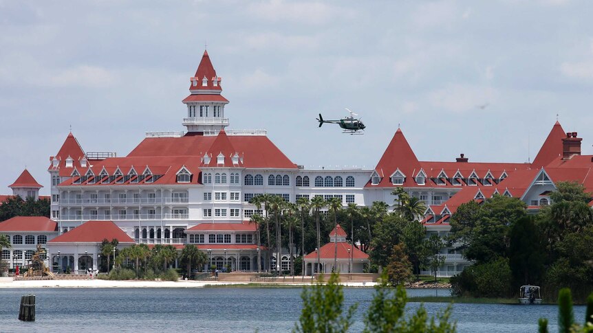 A search helicopter at Disney World where an alligator dragged a boy into the water