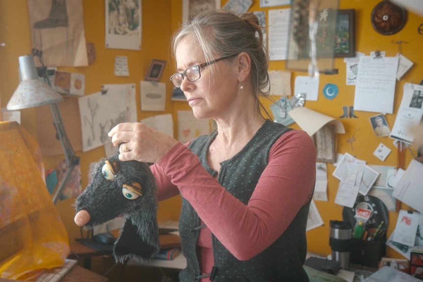 Puppeteer Tina Matthews working on the Rattus puppet.