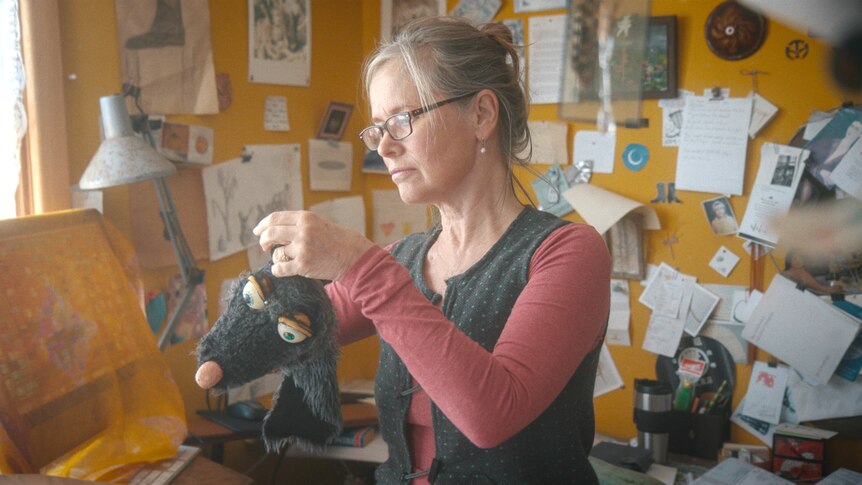 Puppeteer Tina Matthews working on the Rattus puppet.