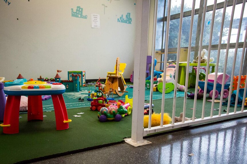 This photo shows an empty children's play pen inside a Canberra prison.