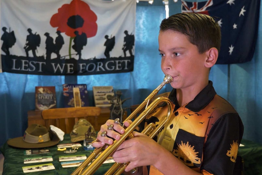 Central Coast resident Matthew Watkins practises the Last Post on his trumpet ahead of Anzac Day 2020.