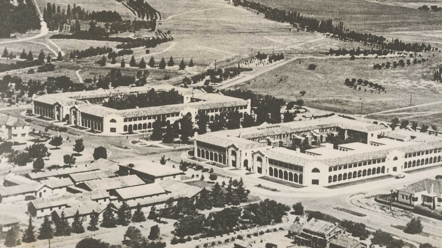 Black and white aerial photo of the Sydney and Melbourne Buildings in Canberra.