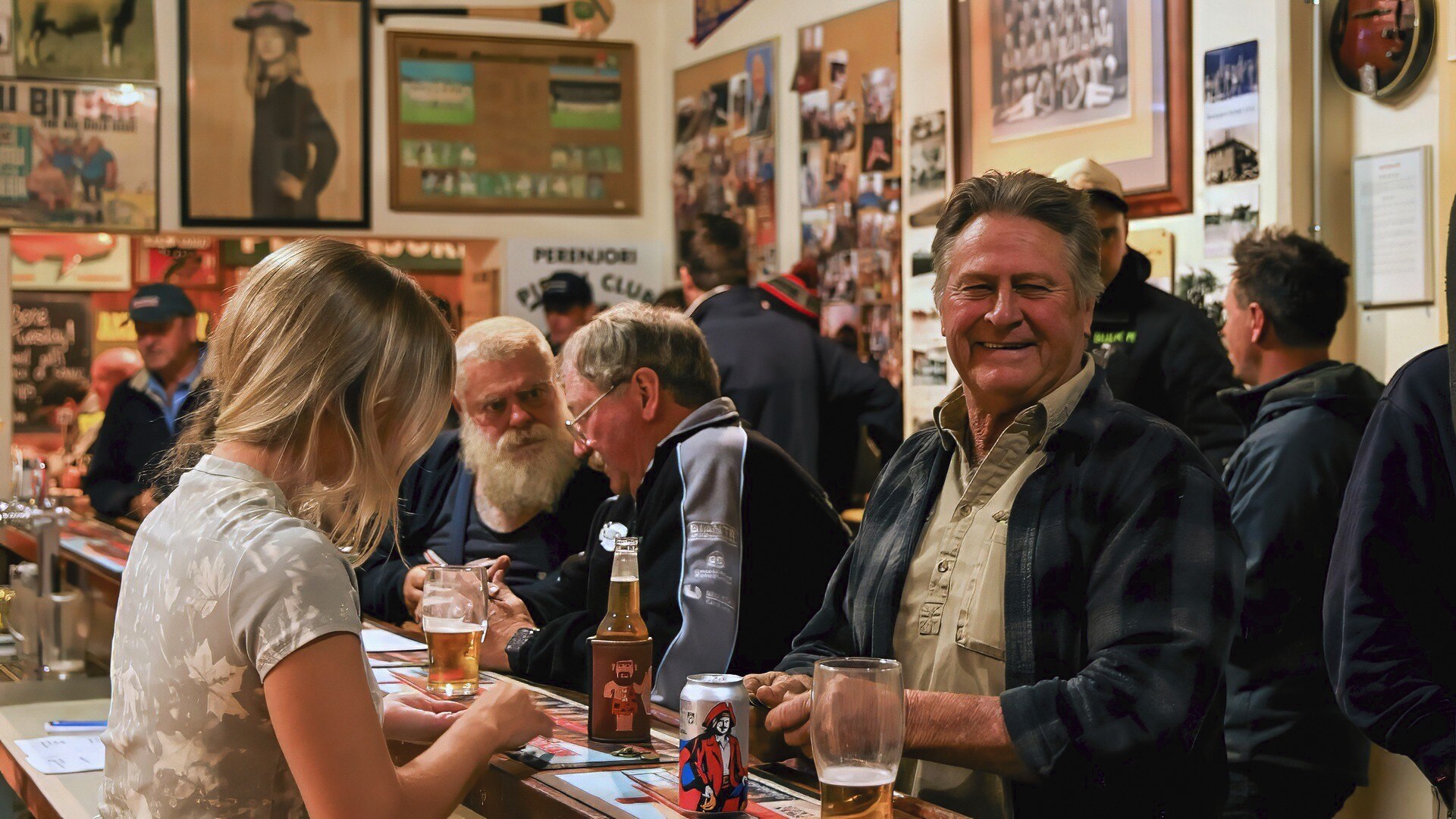Jim Pohl welcomes an ol man through the pub entrance