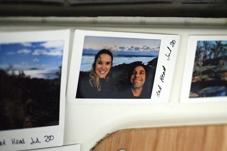 Close up of printed photos with a man and a woman with handwritten captions.