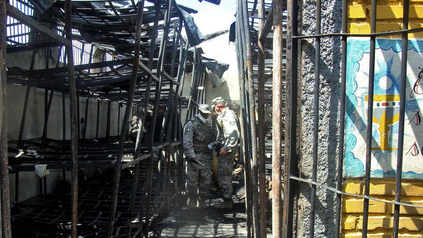 Soldiers inspect the inside of the National Prison compound in Comayagua, Honduras.