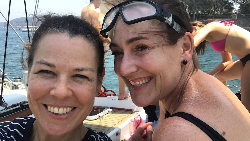 Alison Potter and Kym Gardner take a selfie on a boat