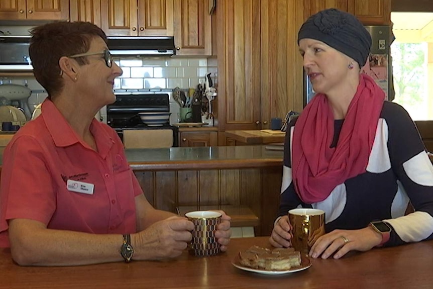 McGrath Breast Care Nurse Sue Munro and breast cancer patient Melissa Heazlewood discussing Melissa's upcoming treatment.