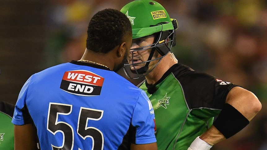 Kieron Pollard of the Strikers (left) and Kevin Pietersen of the Stars exchange words during the Big Bash League.