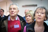 Close up photo of three singers