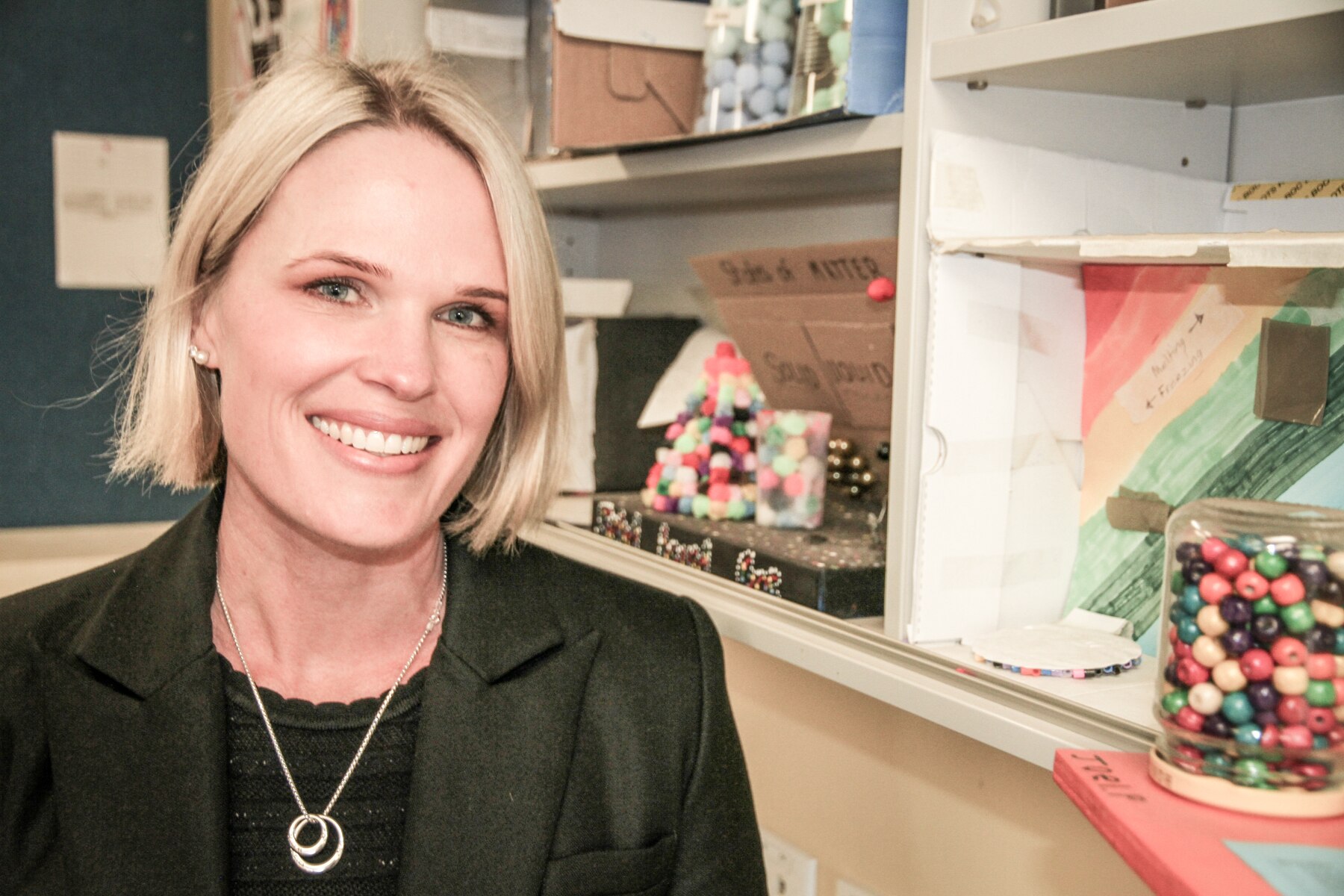 A woman stands in a science classroom at Bulli High School