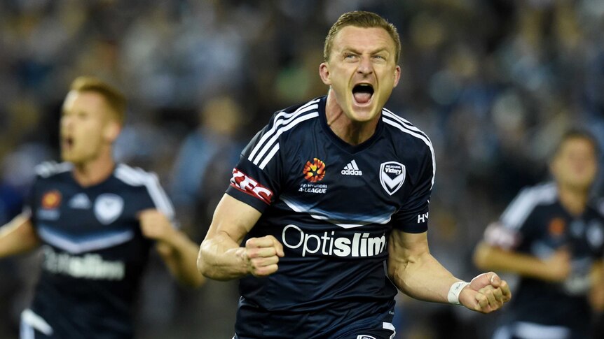 Besart Berisha celebrates after scoring penalty