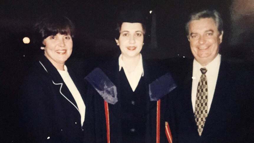 Annastacia Palaszczuk with her parents graduating from university with a law degree.