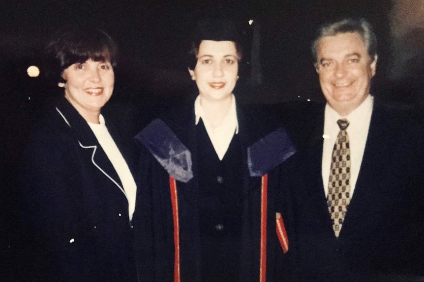 Annastacia Palaszczuk with her parents graduating from university with a law degree.