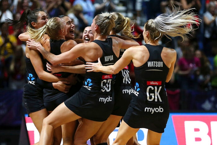 Female netball players celebrate victory after the Netball World Cup final