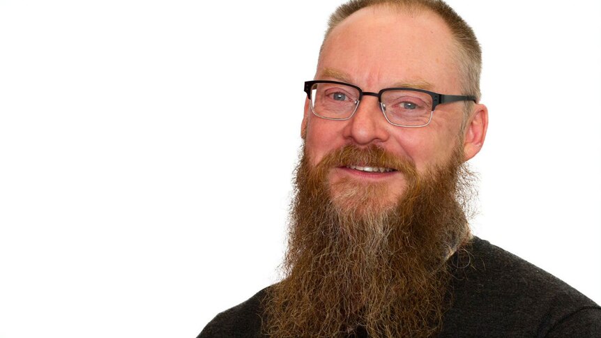 Jeremy Lee photo, man with long beard, wearing glasses.