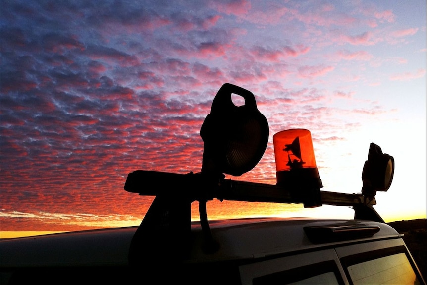 The top of a mine spec ute in the sunset