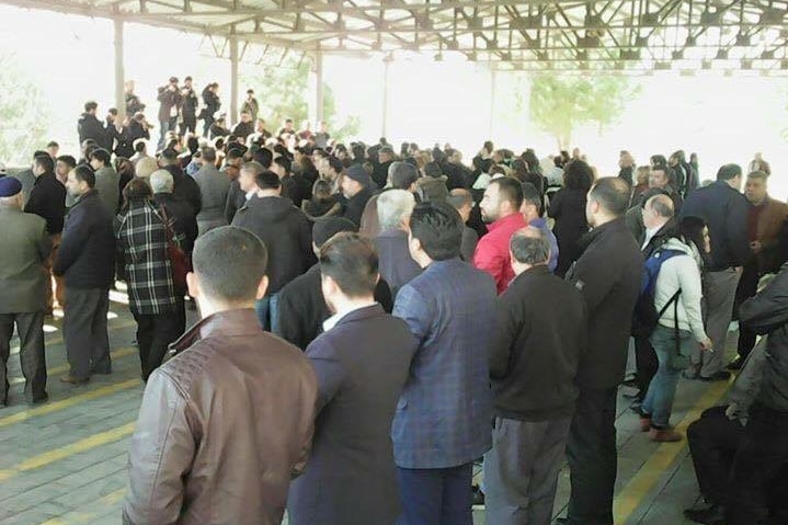 Mourners at the funeral for Naji Jerf