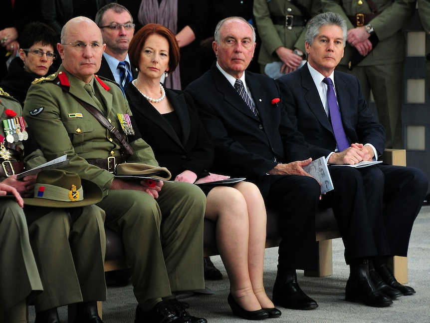 Sad farewell ... PM Julia Gillard, Nationals leader Warren Truss and Defence Minister Stephen Smith.